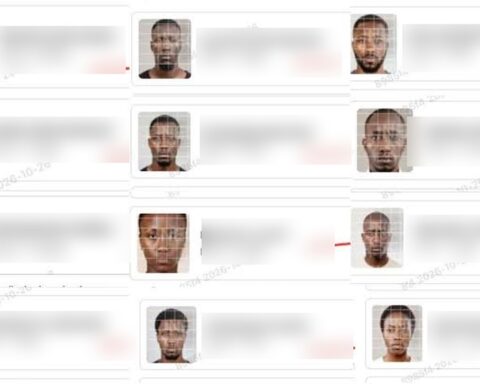 Voter register entries with photos overlaid by a grid pattern, names blurred