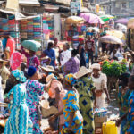 Crowded Lagos market with traders and shoppers