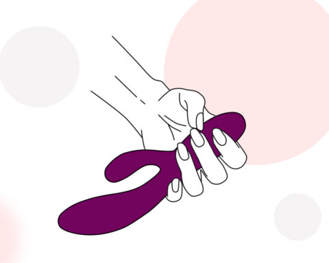 Line illustration of a hand holding a purple vibrator against a pale pink and grey circle background