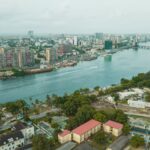Aerial view of the Lagos skyline and lagoon with Ikoyi and Victoria Island in the distance