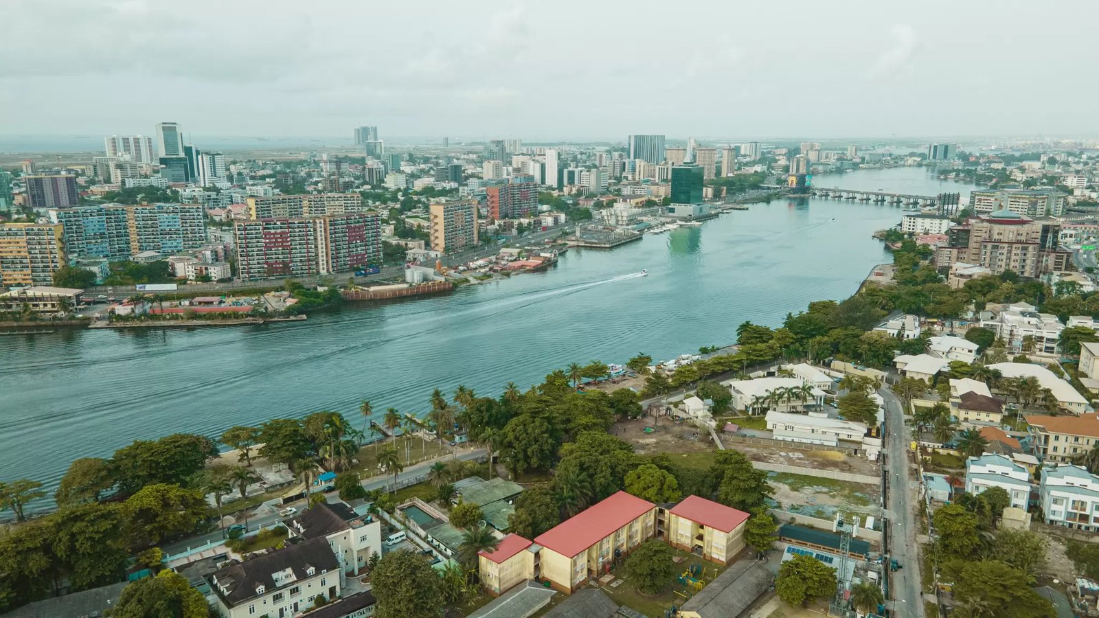 Aerial view of the Lagos skyline and lagoon with Ikoyi and Victoria Island in the distance