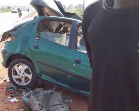 Wrecked green car on the roadside in Minna after a crash involving the Niger State governor’s convoy